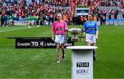 15 September 2019; Emma O’Grady & Julia Collins of Navan O’Mahonys, Co Meath, bring the the Mary Quinn Memorial Cup to the plinth before the TG4 All-Ireland Ladies Football Intermediate Championship Final match between Meath andTipperary at Croke Park in Dublin. Photo by Piaras Ó Mídheach/Sportsfile