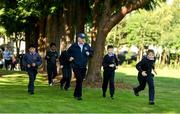 19 September 2019; The Daily Mile aims to get primary school children engaged in daily physical activity to improve their mental and physical health. The Daily Mile Irish Ambassador Frank Greally with pupils from Scoil Mhuire Gan Smál during The Daily Mile Launch at Scoil Mhuire Gan Smál, Inchicore, Dublin. Photo by Eóin Noonan/Sportsfile