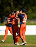 19 September 2019; Brandon Glover of Netherlands is congratulated by Clayton Flloyd of Netherlands after catching out Kyle Coetzer of Scotland during the T20 International Tri Series match between Scotland and Netherlands at Malahide Cricket Club in Dublin. Photo by Harry Murphy/Sportsfile