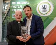 19 September 2019; Fr Michael Sweeney, a founding member of Fanad United, the Donegal League and Ulster Senior League, is presented with a National Football Exhibition Grassroots Hero award by FAI General Manager Noel Mooney at the National Football Exhibition launch in the Regional Cultural Centre, Letterkenny, Donegal. Photo by Oliver McVeigh/Sportsfile