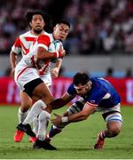 20 September 2019; Yu Tamura of Japan is tackled by Vitaly Zhivatov of Russia the 2019 Rugby World Cup Pool A match between Japan and Russia at the Tokyo Stadium in Chofu, Japan. Photo by Brendan Moran/Sportsfile