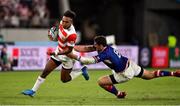 20 September 2019; Kotaro Matsushima of Japan escapes the tackle of Nikita Vavilin of Russia on the way to scoring his side's 4th try during the 2019 Rugby World Cup Pool A match between Japan and Russia at the Tokyo Stadium in Chofu, Japan. Photo by Brendan Moran/Sportsfile