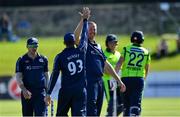 20 September 2019; Adrian Neill, behind, and George Munsey of Scotland celebrate after Gary Wilson of Ireland was bowled out during the T20 International Tri Series match between Ireland and Scotland at Malahide Cricket Club in Dublin. Photo by Piaras Ó Mídheach/Sportsfile