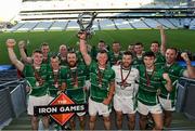 20 September 2019; Iron Cup Winners The Toureen Group, team captain David O'Donnell from Beart Co Donegal lifts the cup as his team-mates celebrate, pictured at Croke Park with the Perpetual Iron Cup for Gaelic Football for the Inaugural Iron Games 2019 in aid of the Irish Haemochromatosis Association (IHA). Well-known Irish construction companies competed in Gaelic Football in Croke Park on Friday, 20th September. Set to raise vital funds to combat the most common genetic disorder in Ireland and to promote health, wellness and engagement amongst construction employees, plans are already afoot to stage the games in 2020, when all industries will be invited to participate and make a real difference to the treatments for this disorder.  Participants can sign up for 2020 or donate on www.haemochromatosis-ir.com. Photo by Matt Browne/Sportsfile