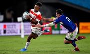 20 September 2019; Kotaro Matsushima of Japan is tackled by Nikita Vavilin of Russia during the 2019 Rugby World Cup Pool A match between Japan and Russia at the Tokyo Stadium in Chofu, Japan. Photo by Brendan Moran/Sportsfile