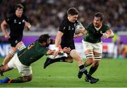 21 September 2019; Beauden Barrett of New Zealand is tackled by Franco Mostert, right and Frans Malherbe of South Africa during the 2019 Rugby World Cup Pool B match between New Zealand and South Africa at the International Stadium in Yokohama, Japan. Photo by Ramsey Cardy/Sportsfile