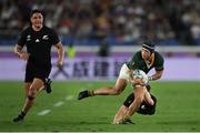 21 September 2019; Cheslin Kolbe of South Africa is tackled by Beauden Barrett of New Zealand during the 2019 Rugby World Cup Pool B match between New Zealand and South Africa at the International Stadium in Yokohama, Japan. Photo by Ramsey Cardy/Sportsfile