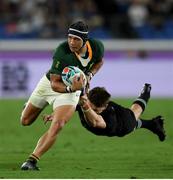 21 September 2019; Cheslin Kolbe of South Africa is tackled by Beauden Barrett of New Zealand during the 2019 Rugby World Cup Pool B match between New Zealand and South Africa at the International Stadium in Yokohama, Japan. Photo by Ramsey Cardy/Sportsfile