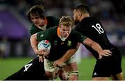 21 September 2019; Pieter-Steph du Toit of South Africa is tackled by Sevu Reece, left, and Angus Ta'avao of New Zealand during the 2019 Rugby World Cup Pool B match between New Zealand and South Africa at the International Stadium in Yokohama, Japan. Photo by Ramsey Cardy/Sportsfile