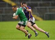 22 September 2019; Peter Lynch of Roslea Shamrocks in action against Ryan Jones of Derrygonnelly Harps during the Fermanagh County Senior Club Football Championship Final match between Derrygonnelly Harps and Roslea Shamrocks at Brewster Park in Enniskillen, Fermanagh. Photo by Oliver McVeigh/Sportsfile