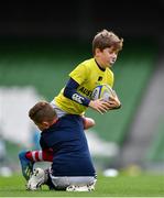 22 September 2019; Aviva Ireland gave 400 children the dream opportunity to take part in the Aviva Mini Nations Cup in Aviva Stadium on Sunday, September 22. 20 U10 boys’ and U12 girls’ teams from clubs nationwide took to the hallowed pitch after Ireland’s heroic win over Scotland in Japan for their very own Mini Rugby Nations Cup. See aviva.ie/safetodream or @AvivaIreland social channels for details. Action from the game between Longford RFC, representing USA and UL Bohemians, Limerick, representing Australia during the Aviva Mini Rugby Nations Cup at Aviva Stadium in Dublin. Photo by Eóin Noonan/Sportsfile