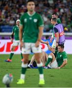 22 September 2019; Peter O’Mahony of Ireland leaves the pitch with an injury, as team-mate Jonathan Sexton is treated for an injury, and Conor Murray prepares to kick a conversion during the 2019 Rugby World Cup Pool A match between Ireland and Scotland at the International Stadium in Yokohama, Japan. Photo by Ramsey Cardy/Sportsfile