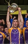 22 September 2019; Ryan Jones of Derrygonnelly Harps lifts the cup after the Fermanagh County Senior Club Football Championship Final match between Derrygonnelly Harps and Roslea Shamrocks at Brewster Park in Enniskillen, Fermanagh. Photo by Oliver McVeigh/Sportsfile