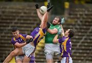 22 September 2019; Sean Quigley of Roslea Shamrocks in action against Shane McGullion, Stephen McGullion and Tiarnan Daly of Derrygonnelly Harps during the Fermanagh County Senior Club Football Championship Final match between Derrygonnelly Harps and Roslea Shamrocks at Brewster Park in Enniskillen, Fermanagh. Photo by Oliver McVeigh/Sportsfile