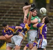 22 September 2019; Sean Quigley of Roslea Shamrocks in action against Shane McGullion, Stephen McGullion and Tiarnan Daly of Derrygonnelly Harps during the Fermanagh County Senior Club Football Championship Final match between Derrygonnelly Harps and Roslea Shamrocks at Brewster Park in Enniskillen, Fermanagh. Photo by Oliver McVeigh/Sportsfile