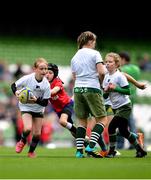22 September 2019; Aviva Ireland gave 400 children the dream opportunity to take part in the Aviva Mini Nations Cup in Aviva Stadium on Sunday, September 22. 20 U10 boys’ and U12 girls’ teams from clubs nationwide took to the hallowed pitch after Ireland’s heroic win over Scotland in Japan for their very own Mini Rugby Nations Cup. See aviva.ie/safetodream or @AvivaIreland social channels for details. Action from the game between Greystones RFC, Wicklow, representing England and Wexford Wanderers, representing Canada during the Aviva Mini Rugby Nations Cup at Aviva Stadium in Dublin. Photo by Eóin Noonan/Sportsfile