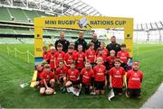 22 September 2019; Aviva Ireland gave 400 children the dream opportunity to take part in the Aviva Mini Nations Cup in Aviva Stadium on Sunday, September 22. 20 U10 boys’ and U12 girls’ teams from clubs nationwide took to the hallowed pitch after Ireland’s heroic win over Scotland in Japan for their very own Mini Rugby Nations Cup. See aviva.ie/safetodream or @AvivaIreland social channels for details. Players from DLS Palmerstown RFC, Dublin, representing Wales with Ireland and Ulster rugby player Jordi Murphy during the Aviva Mini Rugby Nations Cup at Aviva Stadium in Dublin. Photo by Eóin Noonan/Sportsfile
