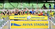 22 September 2019; Aviva Ireland gave 400 children the dream opportunity to take part in the Aviva Mini Nations Cup in Aviva Stadium on Sunday, September 22. 20 U10 boys’ and U12 girls’ teams from clubs nationwide took to the hallowed pitch after Ireland’s heroic win over Scotland in Japan for their very own Mini Rugby Nations Cup. See aviva.ie/safetodream or @AvivaIreland social channels for details. Players from UL Bohemians, Limerick representing Australia lifting the cup following the Aviva Mini Rugby Nations Cup at Aviva Stadium in Dublin. Photo by Eóin Noonan/Sportsfile