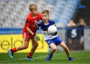 24 September 2019; Conor Flanagan, St Brigids Belfast, Co. Antrim, in action against Braigh Maguire of St James', Co. Antrim, during the Littlewoods Ireland Ulster GAA Go Games Provincial Days’ in Croke Park in Dublin. This year over 6,000 boys and girls aged between six and twelve represented their clubs in a series of mini blitzes and – just like their heroes – got to play in Croke Park.  Photo by Harry Murphy/Sportsfile