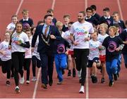 23 September 2019; Athletics Ireland and Dublin City Sport & Wellbeing Partnership are calling on all primary schools in the Dublin City area to sign up to The Daily Mile! Our aim is to get as many schools as possible signed up in the month of September. Pictured are Irish Athletes Ger O’Donnell and Nadia Power, Lord Mayor of Dublin Paul McAuliff and children from Bayside National School and Star Of the Sea, Ringsend, at The Daily Mile Dublin City Schools launch at the Irishtown Stadium in Dublin. Photo by Harry Murphy/Sportsfile