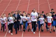 23 September 2019; Athletics Ireland and Dublin City Sport & Wellbeing Partnership are calling on all primary schools in the Dublin City area to sign up to The Daily Mile! Our aim is to get as many schools as possible signed up in the month of September. Pictured are Irish Athletes Ger O’Donnell and Nadia Power, Lord Mayor of Dublin Paul McAuliff and children from Bayside National School and Star Of the Sea, Ringsend, at The Daily Mile Dublin City Schools launch at the Irishtown Stadium in Dublin. Photo by Harry Murphy/Sportsfile