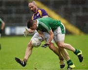 22 September 2019; Diarmuid McAleer of Roslea Shamrocks in action against Kevin Cassidy of Derrygonnelly Harps during the Fermanagh County Senior Club Football Championship Final match between Derrygonnelly Harps and Roslea Shamrocks at Brewster Park in Enniskillen, Fermanagh. Photo by Oliver McVeigh/Sportsfile