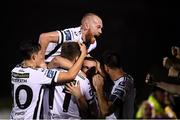 23 September 2019; Dundalk players, including Chris Shields, top, celebrate after Michael Duffy scored their side's third goal during the SSE Airtricity League Premier Division match between Dundalk and Shamrock Rovers at Oriel Park in Dundalk, Co Louth. Photo by Stephen McCarthy/Sportsfile
