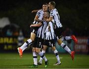 23 September 2019; Dundalk players Chris Shields, centre, Daniel Kelly and Georgie Kelly celebrate following the SSE Airtricity League Premier Division match between Dundalk and Shamrock Rovers at Oriel Park in Dundalk, Co Louth. Photo by Harry Murphy/Sportsfile
