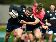24 September 2019; Shane Daly of Munster is tackled by team-mate Liam Coombes during a Munster Rugby Squad Training session at University of Limerick in Limerick Photo by Matt Browne/Sportsfile