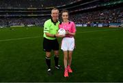 15 September 2019; Niamh McMorrow, from Trim, Co Meath, presents the match ball to referee Brendan Rice ahead of the TG4 All-Ireland Ladies Football Senior Championship Final match between Dublin and Galway at Croke Park in Dublin. Photo by Ramsey Cardy/Sportsfile