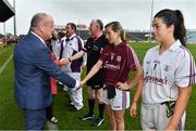 6 July 2019; Liam McDonagh, President of the Connacht Council, LGFA, meets Galway captain Tracey Leonard prior to the 2019 TG4 Connacht Ladies Senior Football Final replay between Galway and Mayo at the LIT Gaelic Grounds in Limerick. Photo by Brendan Moran/Sportsfile