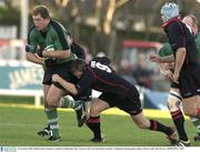 15 November 2003; Michael Swift, Connacht, is tackled by Edinburgh's Rory Lawson. Celtic Cup Semi-Final, Connacht v Edinburgh, Sportsgrounds, Galway. Picture credit; Matt Browne / SPORTSFILE *EDI*