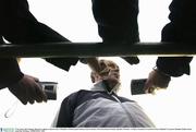 15 November 2003; Manager Brian Kerr talking to reporters after a Republic of Ireland squad training session in advance of the International Friendly, Republic of Ireland v Canada, to be played at Lansdowne Road. Malahide FC grounds, Malahide, Dublin. Picture credit; Ray McManus / SPORTSFILE *EDI*