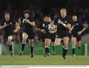 8 November 2003; Justin Marshall, New Zealand, races down the field against South Africa. 2003 Rugby World Cup, Quarter Final, New Zealand v South Africa, Telstra Dome, Melbourne, Victoria, Australia. Picture credit; Brendan Moran / SPORTSFILE *EDI*