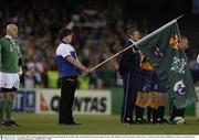 9 November 2003; Ireland captain Keith Woood stands alongside the Ireland rugby team flag before the game against France. 2003 Rugby World Cup, Quarter Final, France v Ireland, Telstra Dome, Melbourne, Victoria, Australia. Picture credit; Brendan Moran / SPORTSFILE *EDI*