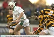 16 November 2003; Colin Furlong, O'Loughlin Gaels, escapes the tackle of Rathnure's Stephen Somers, 3, and Anthony O'Connell. AIB Leinster Club Hurling Championship Semi-Final, Rathnure v O'Loughlin Gaels, Dr. Cullen Park, Carlow. Picture credit; Matt Browne / SPORTSFILE *EDI*