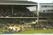 31 October 2003; The Ireland and Australian teams stsnd together for the national anthems. Foster's International Rules, Australia v Ireland, Second Test, Melbourne Cricket Ground, Melbourne, Victoria, Australia. Picture credit; Brendan Moran / SPORTSFILE *EDI*