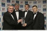 7 November 2003; An Taoiseach, Bertie Ahern, George Wallace, General Manager SEAT, Tom Kenny from Cork, SEAT GPA Hurler of The Month for June, Dessie Farrell, pictured at the Carphone Warehouse sponsored GPA Gala night featuring the Seat Player of Year Awards, Burlington Hotel, Dublin. Picture credit; Ray McManus / SPORTSFILE *EDI*