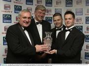 7 November 2003; An Taoiseach, Bertie Ahern, George Wallace, General Manager, SEAT, Dessie Farrell Chief Executive GPA and Tomas Mc Grane SEAT Hurler of the month for May, pictured at the Carphone Warehouse sponsored GPA Gala night featuring the Seat Player of Year Awards, Burlington Hotel, Dublin. Picture credit; Ray McManus / SPORTSFILE *EDI*