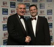 7 November 2003; An Taoiseach, Bertie Ahern and Eddie Kavanagh, Sales Manager, SEAT, pictured at the Carphone Warehouse sponsored GPA Gala night featuring the Seat Player of Year Awards, Burlington Hotel, Dublin. Picture credit; Ray McManus / SPORTSFILE *EDI*