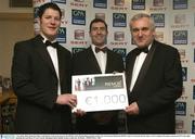 7 November 2003; Donnach Callen, Louth Hurler receives his award as the REMUS GPA Hurling Representative of the Year from Eamon Rainsford, REMUS and An Taoiseach, Bertie Ahern, at the Carphone Warehouse sponsored GPA Gala night featuring the Seat Player of Year Awards, Burlington Hotel, Dublin. Picture credit; Ray McManus / SPORTSFILE *EDI*