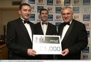 7 November 2003; Westmeath Footballer, David Mitchell receives the REMUS GPA Representative Of The Year Award 2003 from Eamon Rainsford, REMUS and An Taoiseach, Bertie Ahern at the Carphone Warehouse sponsored GPA Gala night featuring the Seat Player of Year Awards, Burlington Hotel, Dublin. Picture credit; Ray McManus / SPORTSFILE *EDI*