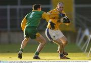 23 November 2003; Ciaran Gallagher, St. Galls, in action against Damien Cassidy, Four Masters. AIB Ulster Club Football Championship Semi-Final, Four Masters v St. Galls, St. Tighearnach's Park, Clones, Co. Monaghan. Picture credit; David Maher / SPORTSFILE *EDI*
