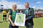 22 June 2013; Nikki Symmons, Ireland, is presented with a framed portrait by Richard Hendrick, Vice-President Irish Hockey Association, after taking her 200th cap before of the game. Electric Ireland Senior Women’s International Friendly, Ireland v Canada, National Hockey Stadium, UCD, Belfield, Dublin. Picture credit: Barry Cregg / SPORTSFILE