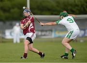 22 June 2013; David Fennell, Westmeath, in action against Henry Vaughan, London. GAA Hurling All-Ireland Senior Championship Preliminary Round, London v Westmeath, Emerald Park, Ruislip, London, England. Picture credit: Oliver McVeigh / SPORTSFILE