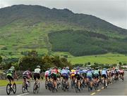23 June 2013; A general view of the peloton on the approach to Carlingford village during the Elite Men's National Road Race Championships. 2013 National Road Race Championships, Carlingford, Co. Louth. Picture credit: Stephen McMahon / SPORTSFILE