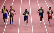 27 September 2019; Christian Coleman of USA, centre, on his way to winning his heat whilst competing in the Men's 100m Round 1 during day one of the World Athletics Championships 2019 at the Khalifa International Stadium in Doha, Qatar. Photo by Sam Barnes/Sportsfile