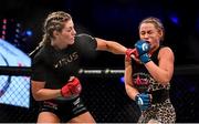 27 September 2019; Leah McCourt, left, in action against Kerry Hughes during their women's featherweight bout at Bellator 227 in the 3Arena, Dublin. Photo by David Fitzgerald/Sportsfile