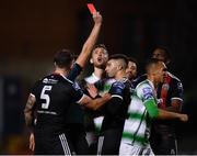 27 September 2019; Daniel Mandroiu of Bohemians, centre, is shown a red card by referee Robert Hennessy during the Extra.ie FAI Cup Semi-Final match between Bohemians and Shamrock Rovers at Dalymount Park in Dublin. Photo by Seb Daly/Sportsfile