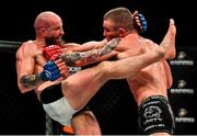 27 September 2019; Peter Queally, left, in action against Ryan Scope during their welterweight bout at Bellator Dublin in the 3Arena, Dublin. Photo by David Fitzgerald/Sportsfile